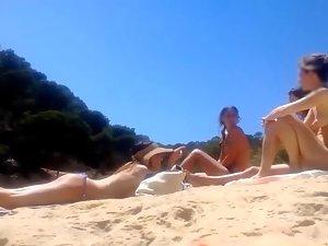 Topless cuties on the beach Picture 3