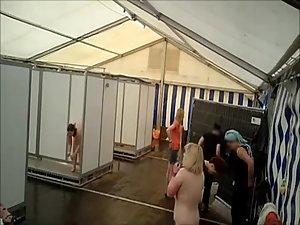 Lots of naked girls in a big public shower Picture 2