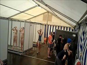 Lots of naked girls in a big public shower Picture 6
