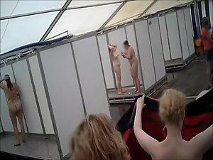 Lots of naked girls in a big public shower Picture 8