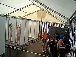 Lots of naked girls in a big public shower
