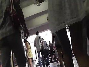 Tanned butt under a short white skirt Picture 4