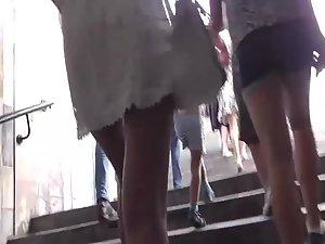 Tanned butt under a short white skirt Picture 5