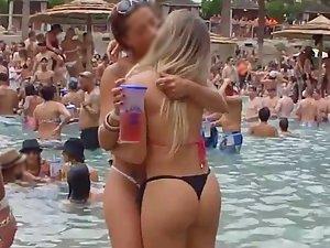 Slutty girls kiss during pool party