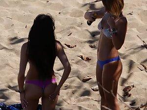 Two equally sexy friends in tiny bikinis at the beach Picture 2