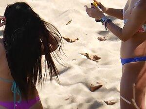 Two equally sexy friends in tiny bikinis at the beach Picture 3