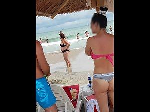 Awesome ass in thong panties on a beach Picture 1