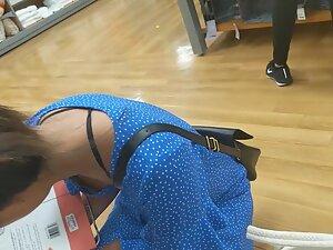 Downblouse look on cute asian lady