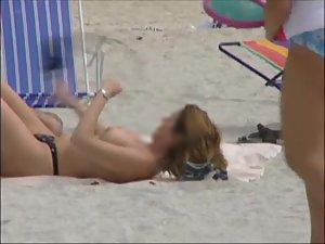 Hot topless girls at the beach Picture 3
