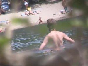 Tender nudist girl got filmed by a voyeur Picture 2