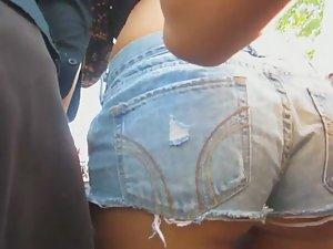 Blonde in booty shorts on the fence Picture 5