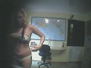 Young school teacher changes clothes Picture 1