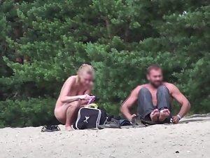 Voyeur zooms on young nudist couple Picture 1
