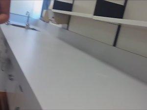 Big tits in downblouse at the office Picture 1