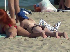 Slow motion of a redhead lying down Picture 8