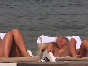 Topless girls relaxing by the beach Picture 1