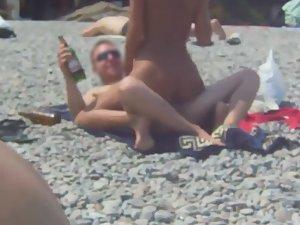 Horny couple filmed fucking on beach
