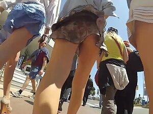 Wind shows upskirts of three asses to the candid camera Picture 8
