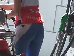 Young gas station worker is smoking hot