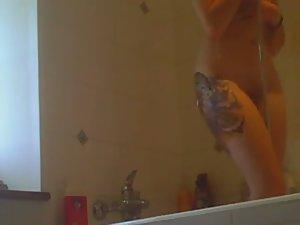 Tattooed girl voyeured in the shower Picture 1