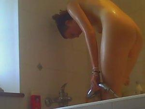 Tattooed girl voyeured in the shower Picture 4