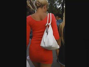 Perfect body of tourist girl in tight red dress Picture 1