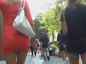 Perfect body of tourist girl in tight red dress Picture 2