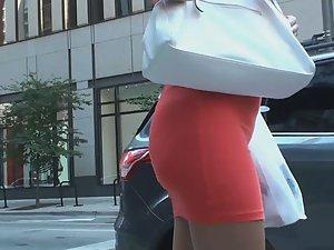 Perfect body of tourist girl in tight red dress Picture 4