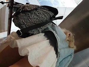 Upskirt of gorgeous young blonde Picture 3