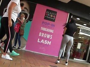 Girl with fantastic ass walks in front of her friends