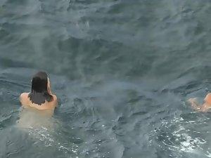 Nudist girls swimming and having fun in water Picture 1
