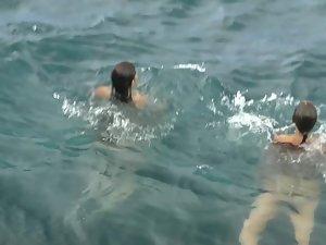 Nudist girls swimming and having fun in water Picture 2