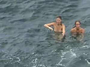 Nudist girls swimming and having fun in water Picture 3