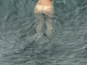 Nudist girls swimming and having fun in water Picture 8