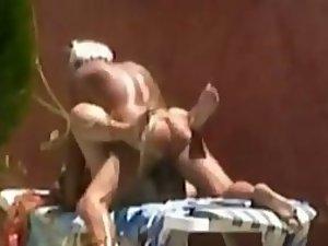 Horny couple fuck is spied by the pool