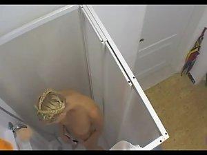 Spying blonde girl's shower orgasm Picture 5