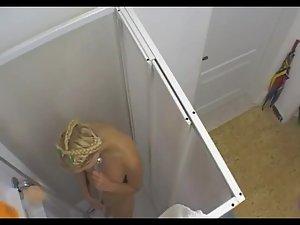 Spying blonde girl's shower orgasm Picture 6