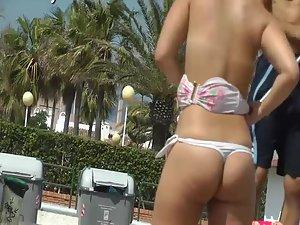 Adorable teenage ass in a thong bikini Picture 5