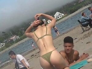 Thong bikini shows her round ass and yummy cameltoe Picture 4