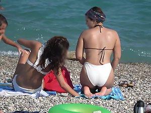 Inspection of two teen friends in big white bikinis Picture 4