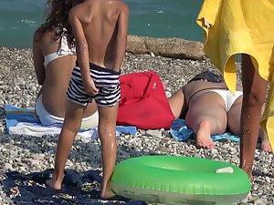 Inspection of two teen friends in big white bikinis Picture 5