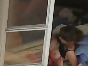 Peep on a girl teasing some guy with tits