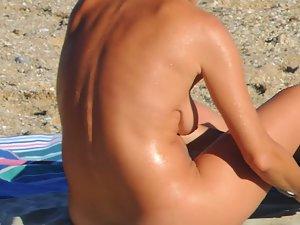 Hot milf changes bikini on beach Picture 3