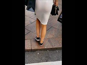 Tight white dress reveals tight buttocks and thong Picture 2