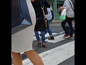 Tight white dress reveals tight buttocks and thong Picture 3