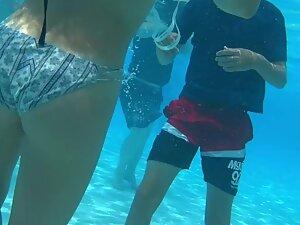 Underwater look at pubes sticking out of her bikini Picture 1