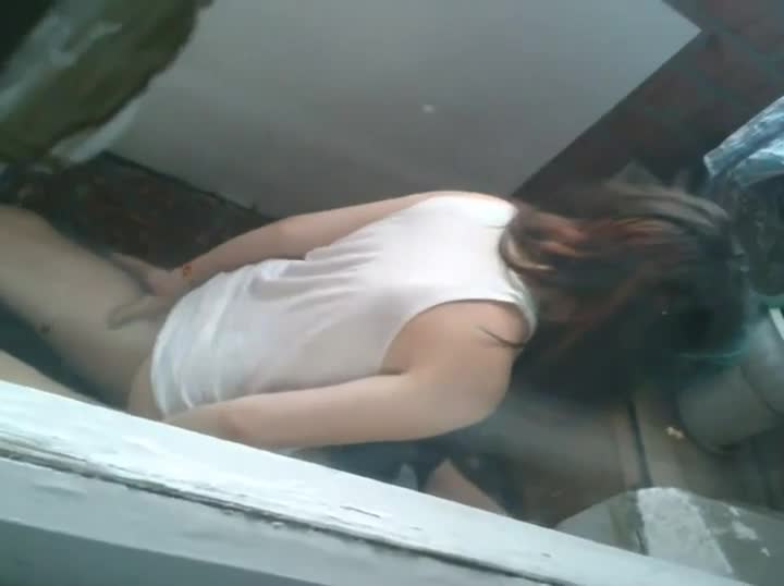 Two teens caught having sex on balcony pic