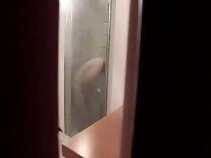 Girl shaves her pussy in the shower Picture 3