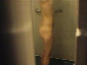 Watching my skinny aunt showering Picture 2