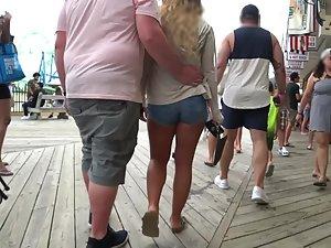 Fat guy keeps touching girlfriend's hot butt Picture 2